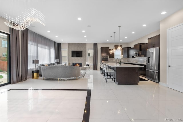 11193 Mission Walk St, Parker, CO 80134 - living area featuring recessed lighting and a large fireplace