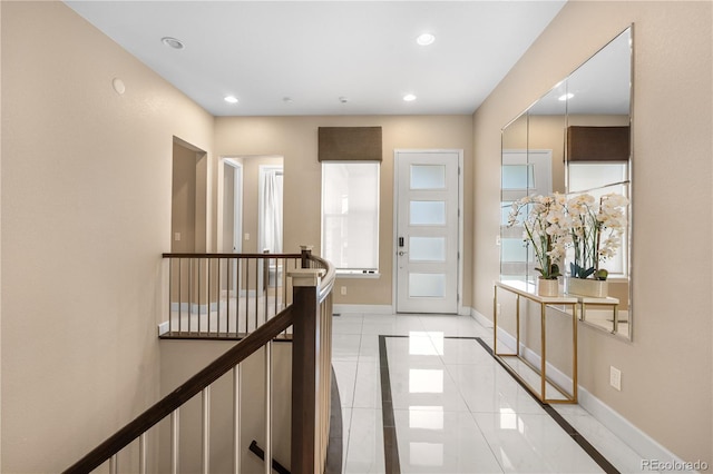 11193 Mission Walk St, Parker, CO 80134 - foyer with light tile patterned floors, inlaid floor details, and recessed lighting