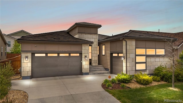 11193 Mission Walk St, Parker, CO 80134 - contemporary house with an attached garage and driveway