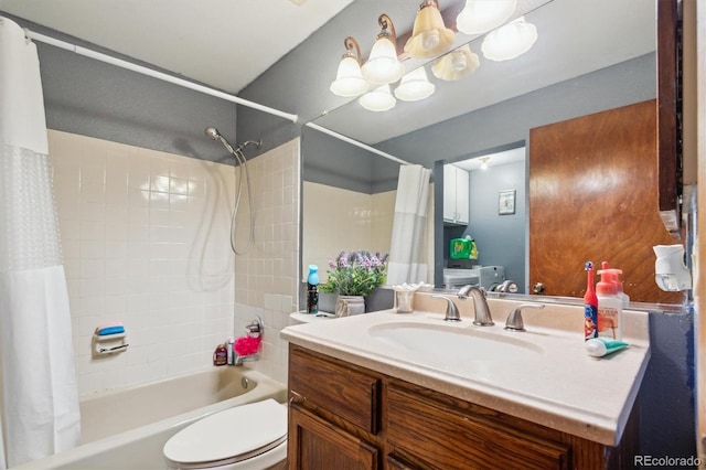 full bathroom featuring shower / tub combo, vanity, and toilet