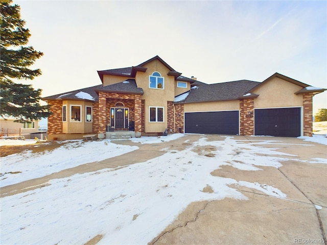 view of front of property with a garage