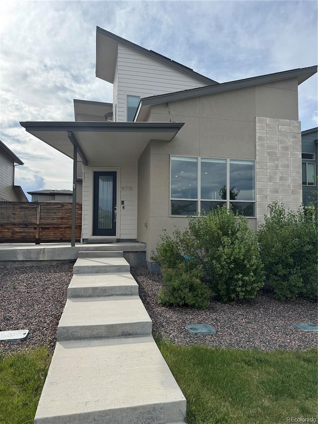 9715 Taylor River Cir, Littleton, CO 80125 - view of front of house with stucco siding