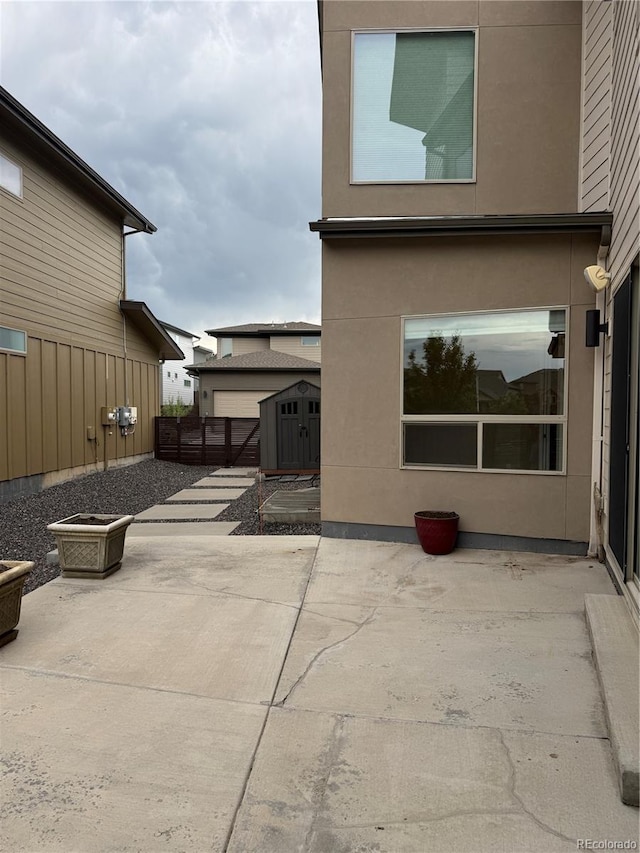 9715 Taylor River Cir, Littleton, CO 80125 - view of patio with a shed