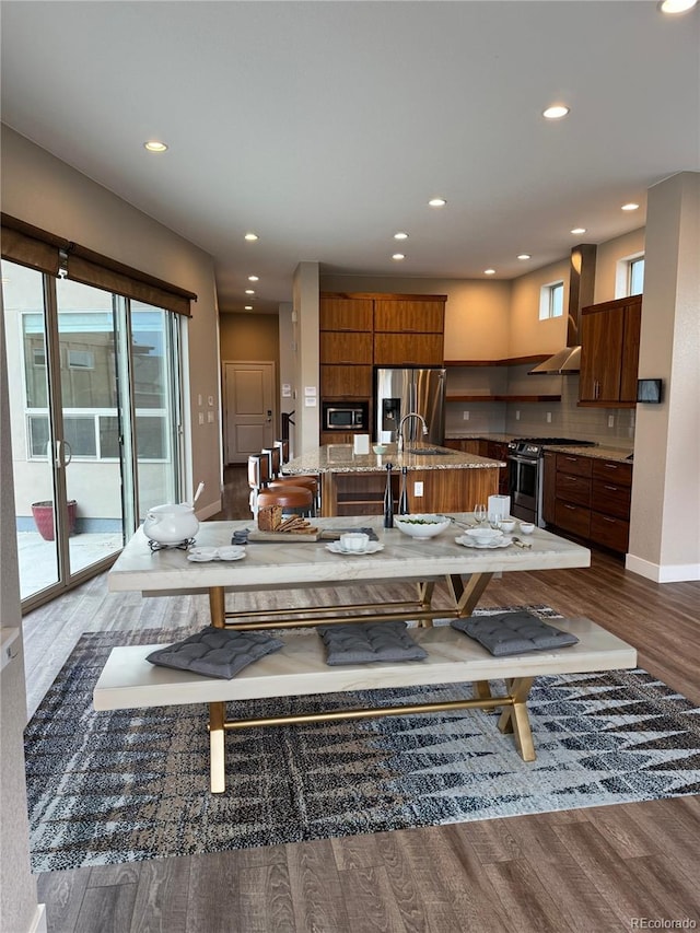 9715 Taylor River Cir, Littleton, CO 80125 - dining area with dark wood-type flooring and recessed lighting
