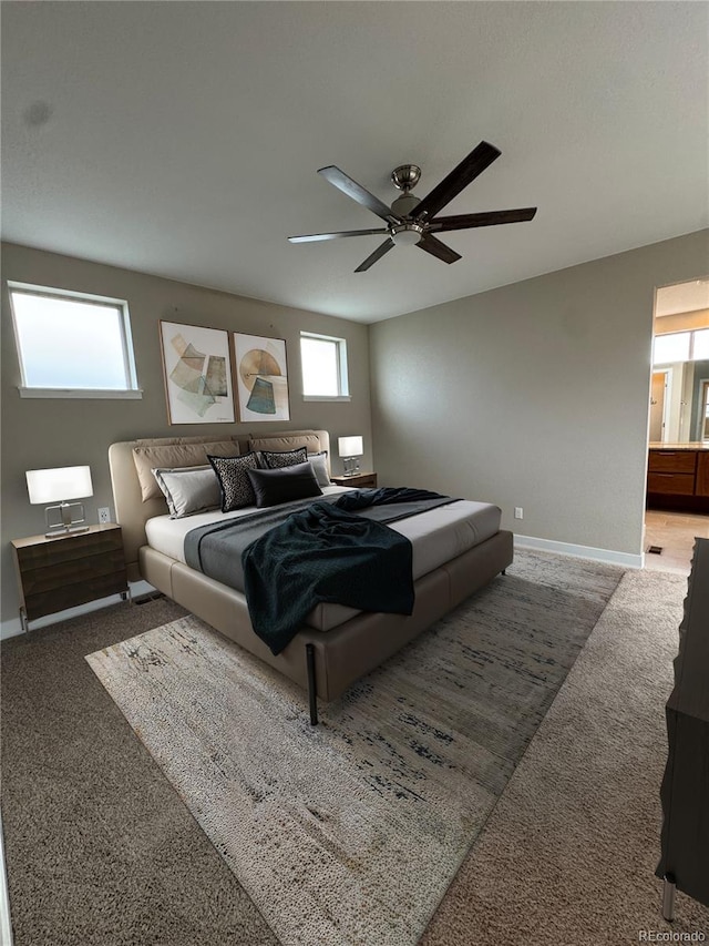 9715 Taylor River Cir, Littleton, CO 80125 - carpeted bedroom with baseboards and a ceiling fan