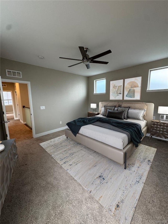 9715 Taylor River Cir, Littleton, CO 80125 - bedroom featuring carpet flooring and a ceiling fan