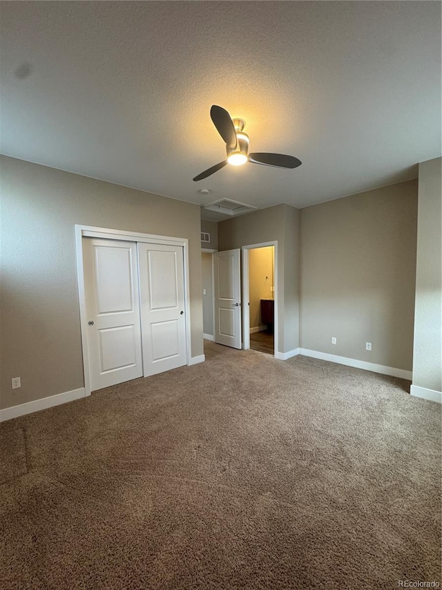 9715 Taylor River Cir, Littleton, CO 80125 - unfurnished bedroom with carpet flooring, a closet, a ceiling fan, and a textured ceiling