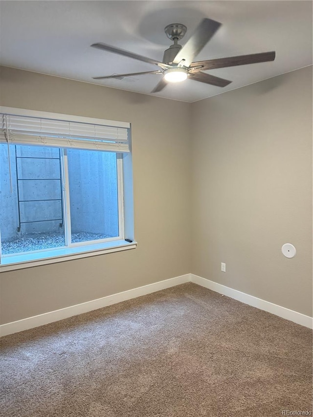 9715 Taylor River Cir, Littleton, CO 80125 - carpeted spare room with a ceiling fan and baseboards