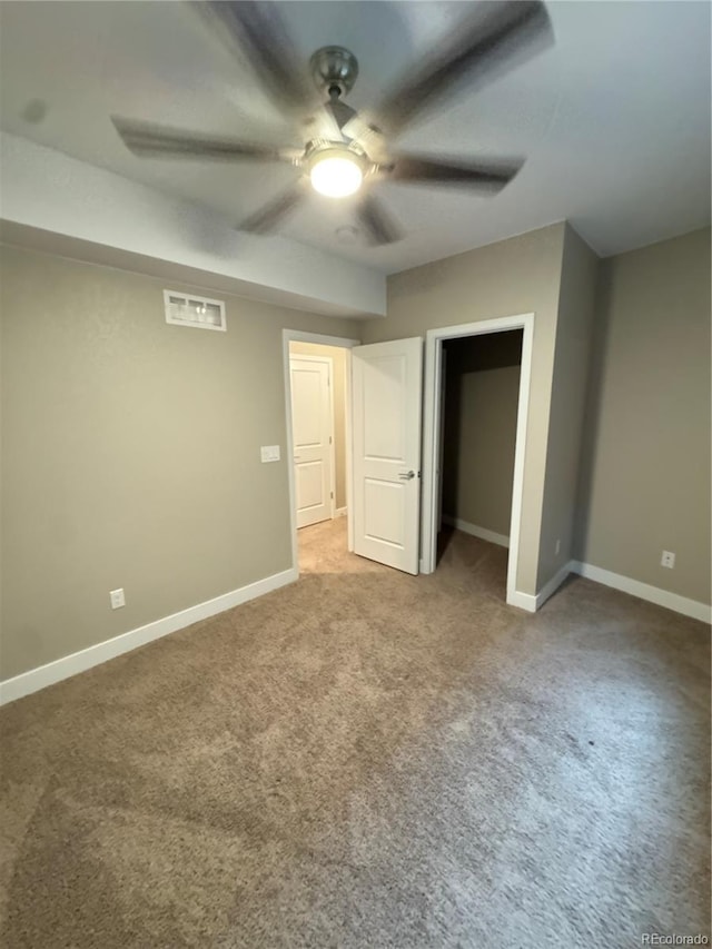 9715 Taylor River Cir, Littleton, CO 80125 - unfurnished bedroom with carpet floors, a closet, and a ceiling fan