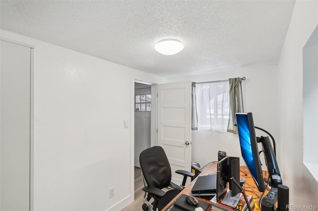 office with a textured ceiling