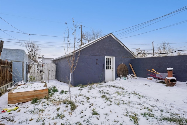 view of snow covered house