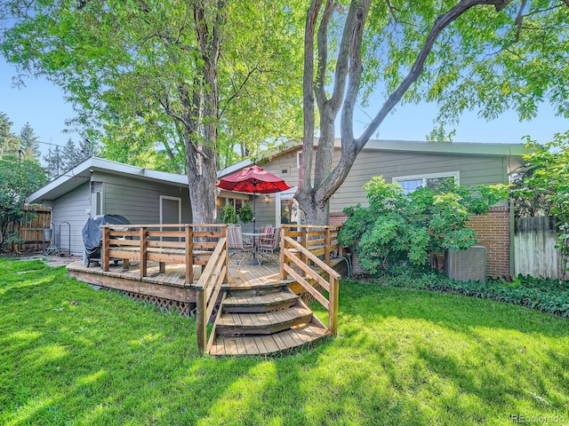 2609 S Dahlia St, Denver, CO 80222 - back of property with a wooden deck and brick siding