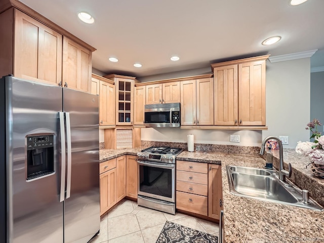2609 S Dahlia St, Denver, CO 80222 - kitchen featuring stainless steel appliances, a sink, light brown cabinetry, crown molding, and recessed lighting