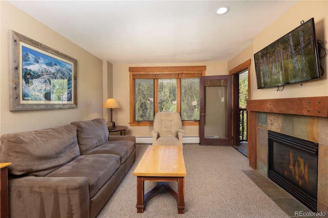 53 Hunki Dori Ct Unit 8886, Keystone, CO 80435 - living room featuring a baseboard heating unit, a tile fireplace, carpet, and recessed lighting