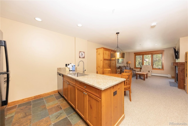 53 Hunki Dori Ct Unit 8886, Keystone, CO 80435 - kitchen with dishwasher, a peninsula, baseboard heating, light stone counters, and a fireplace with flush hearth