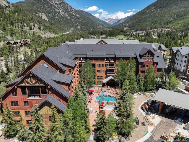 53 Hunki Dori Ct Unit 8886, Keystone, CO 80435 - drone / aerial view of a mountain backdrop and a pool area