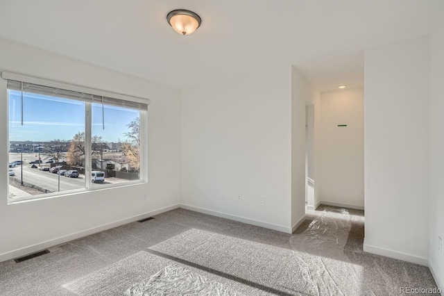 empty room featuring carpet