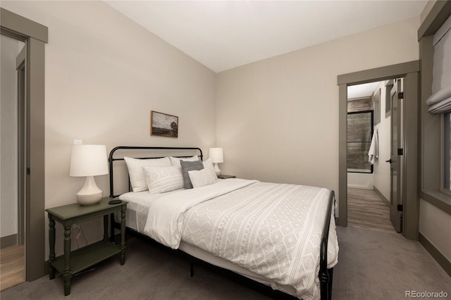 bedroom featuring carpet floors and baseboards