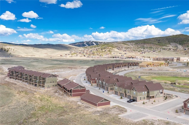drone / aerial view of a mountain backdrop