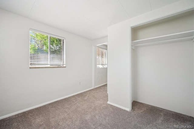 5549 S Greenwood St, Littleton, CO 80120 - unfurnished bedroom with carpet flooring, multiple windows, and a closet