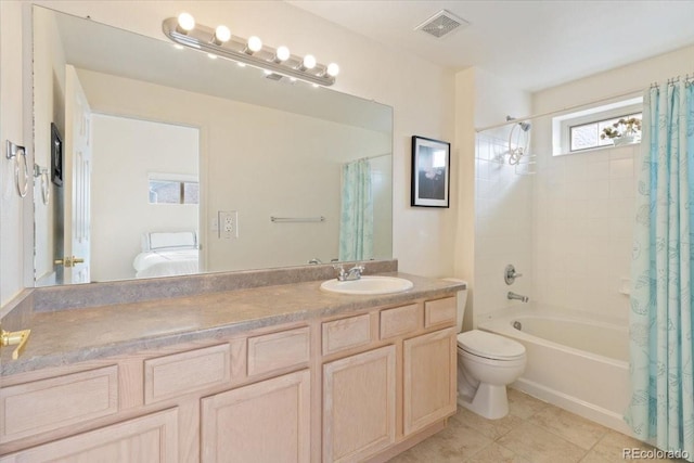 18661 E Water Dr Unit F, Aurora, CO 80013 - bathroom featuring shower / tub combo with curtain, ensuite bathroom, vanity, and tile patterned floors