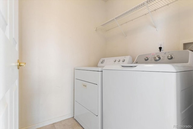 18661 E Water Dr Unit F, Aurora, CO 80013 - laundry room with washer and dryer and baseboards