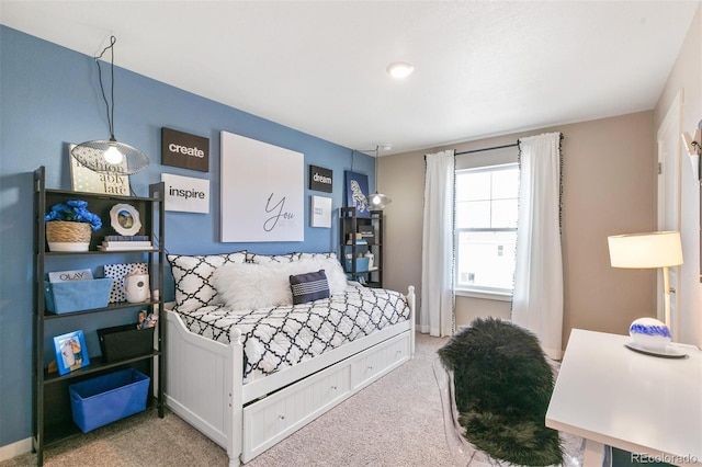 bedroom featuring carpet