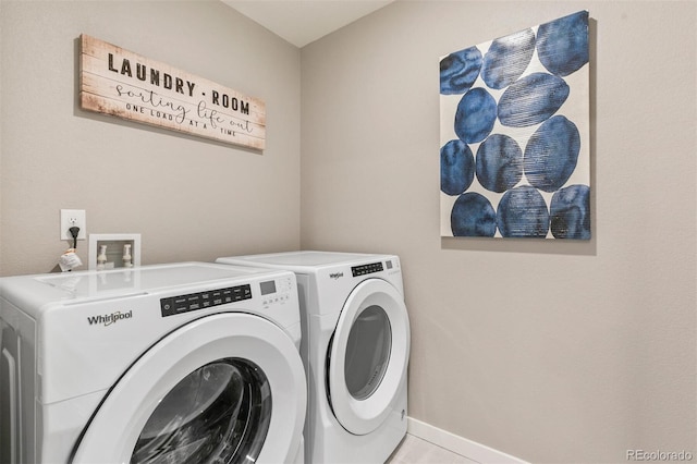 washroom with washer and clothes dryer