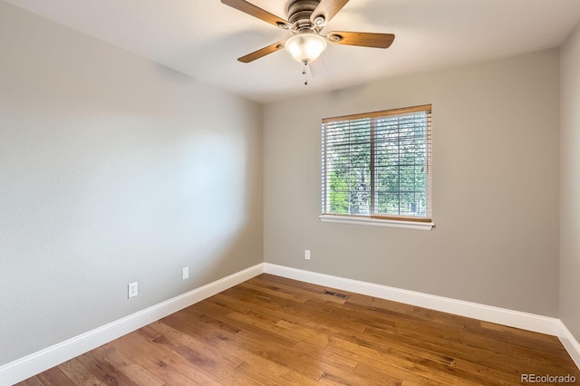 1616 Cedarwood Dr, Longmont, CO 80504 - empty room with ceiling fan and wood finished floors