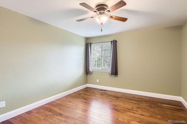1616 Cedarwood Dr, Longmont, CO 80504 - empty room featuring a ceiling fan and wood-type flooring