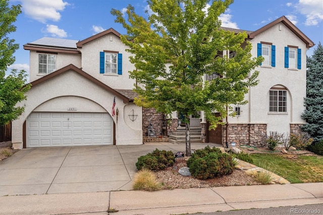 view of front of home with a garage