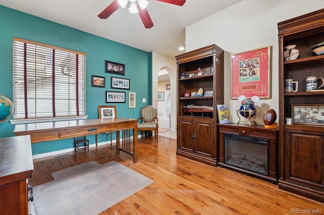 office area with ceiling fan and light hardwood / wood-style flooring