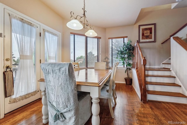 dining space featuring hardwood / wood-style floors