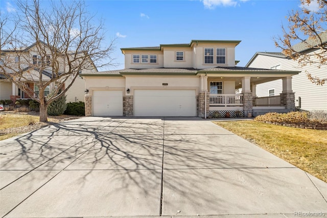 view of front facade featuring concrete driveway, stone siding, covered porch, a front lawn, and stucco siding