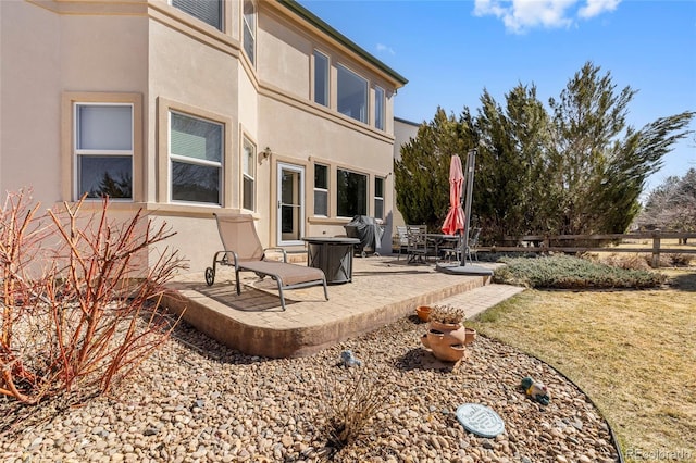 view of patio with fence