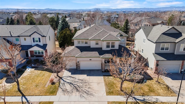 bird's eye view with a residential view and a mountain view