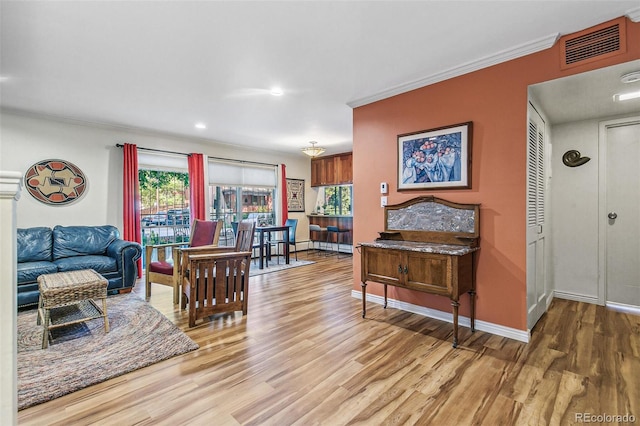 1200 N Humboldt St Unit 101, Denver, CO 80218 - living room featuring light wood-style flooring, healthy amount of natural light, crown molding, and recessed lighting