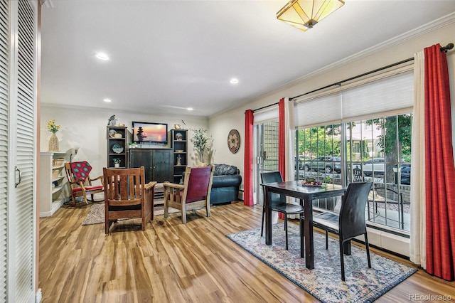 1200 N Humboldt St Unit 101, Denver, CO 80218 - dining room with ornamental molding, wood finished floors, and recessed lighting