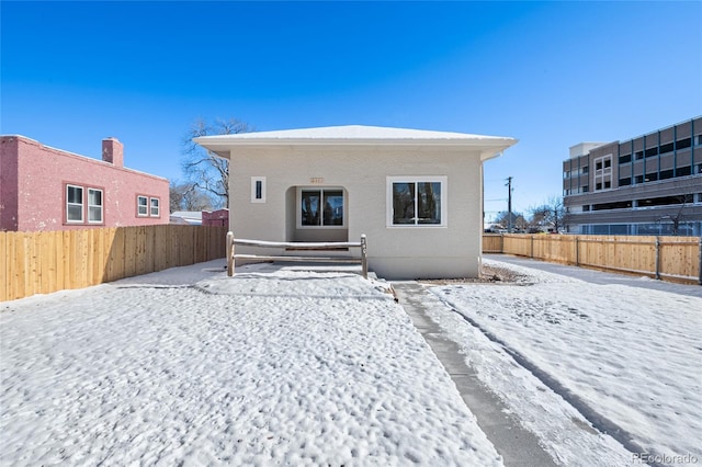 view of snow covered property