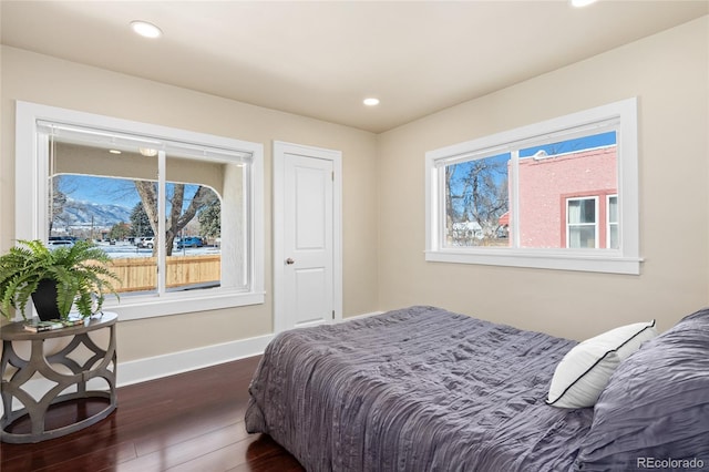 bedroom featuring dark hardwood / wood-style flooring