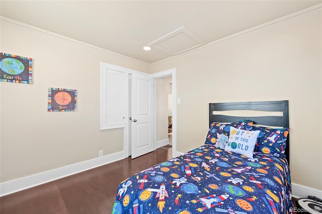 bedroom with crown molding and dark hardwood / wood-style floors