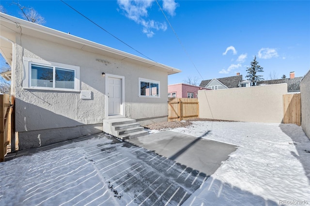 rear view of house with a patio