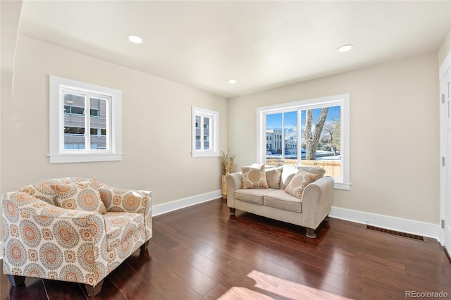 living room featuring dark hardwood / wood-style floors