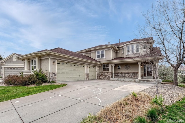 view of front of home featuring stone siding, a garage, stucco siding, a porch, and driveway