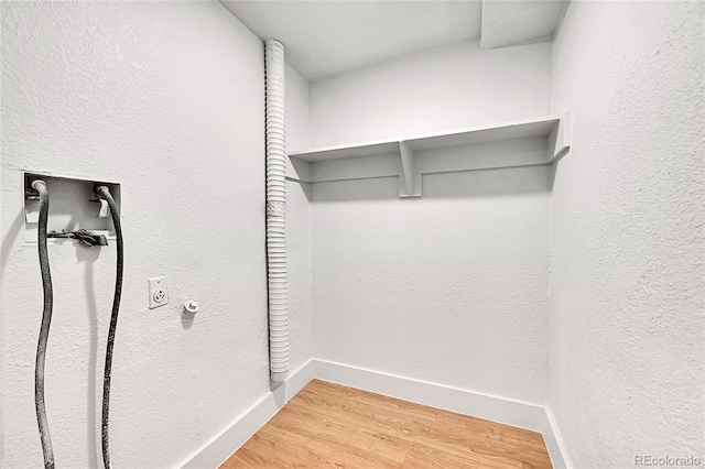 spacious closet with wood-type flooring