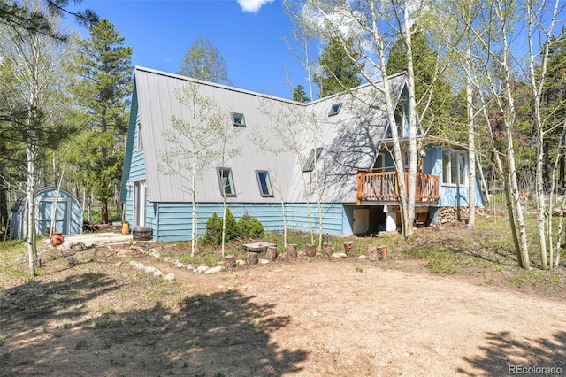 779 High Point Cir, Black Hawk, CO 80422 - view of side of property featuring a wooden deck