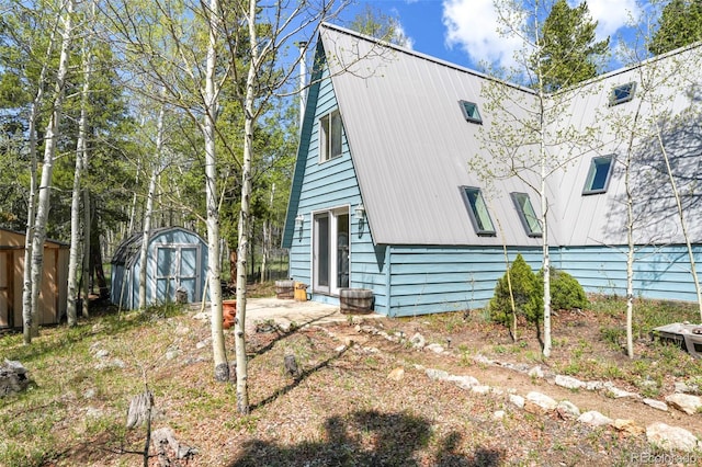 779 High Point Cir, Black Hawk, CO 80422 - view of property exterior with metal roof