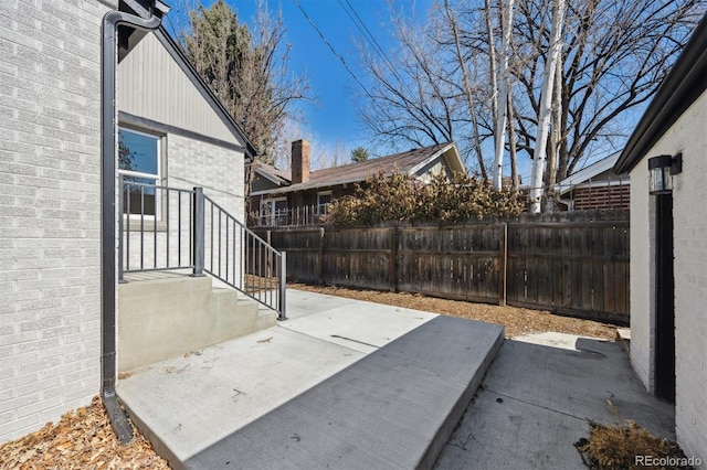 view of patio with fence