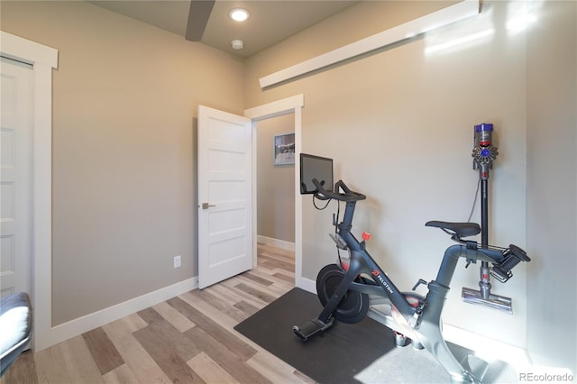 exercise area with light hardwood / wood-style floors