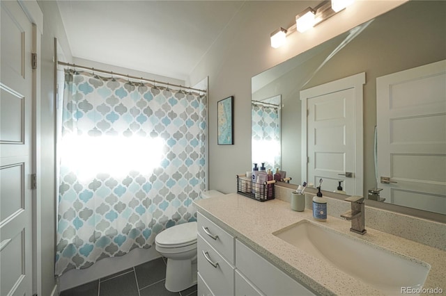 full bathroom featuring tile patterned floors, vanity, toilet, and shower / bath combo